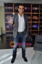 Tusshar Kapoor wins Best Actor in a comic role at the 1st Jeeyo Bollywood Awards on 10th May 2011 (33).JPG